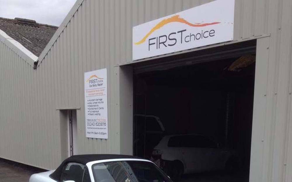 car parked outside first choice shop