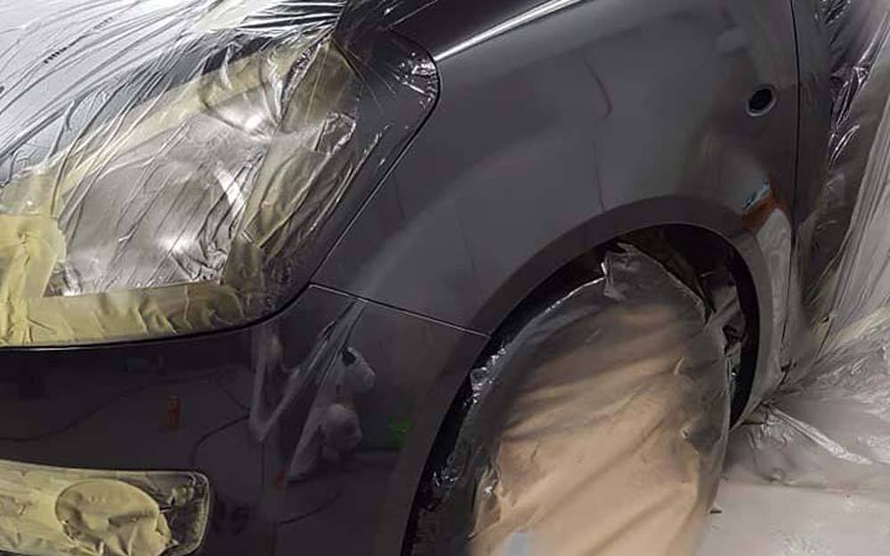 black spray paint on car